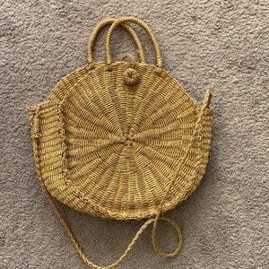 Straw and gold purse